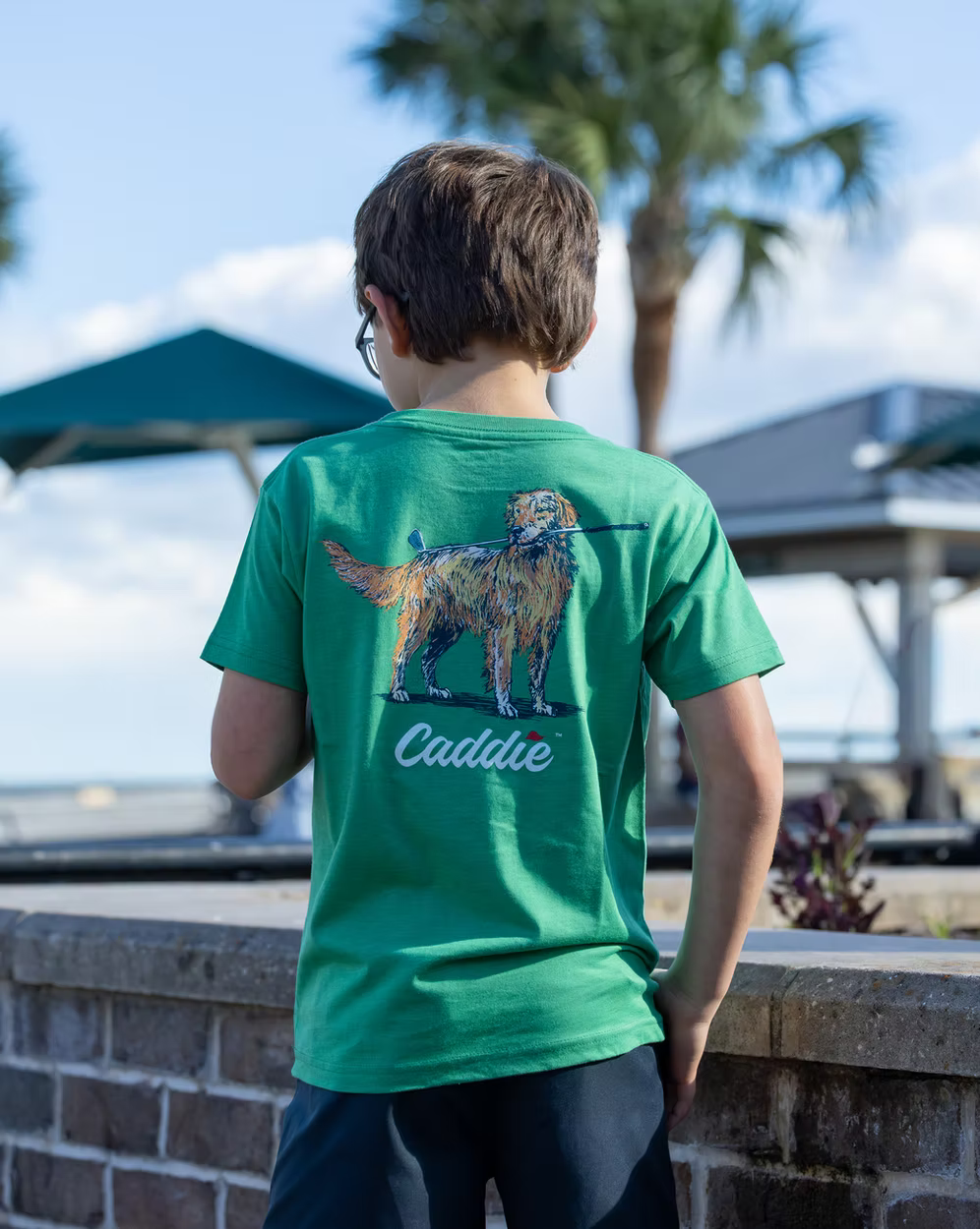 Caddie Youth Club Retriever Shirt featuring a classic design, lightweight fabric, and comfortable fit for young golf enthusiasts.