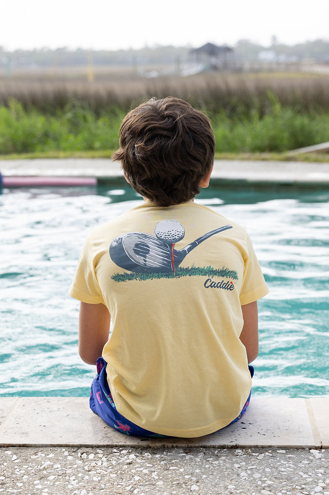 Youth Caddie lined-up shirt, front view showing the casual design, long sleeves, and classic collar on a white background.