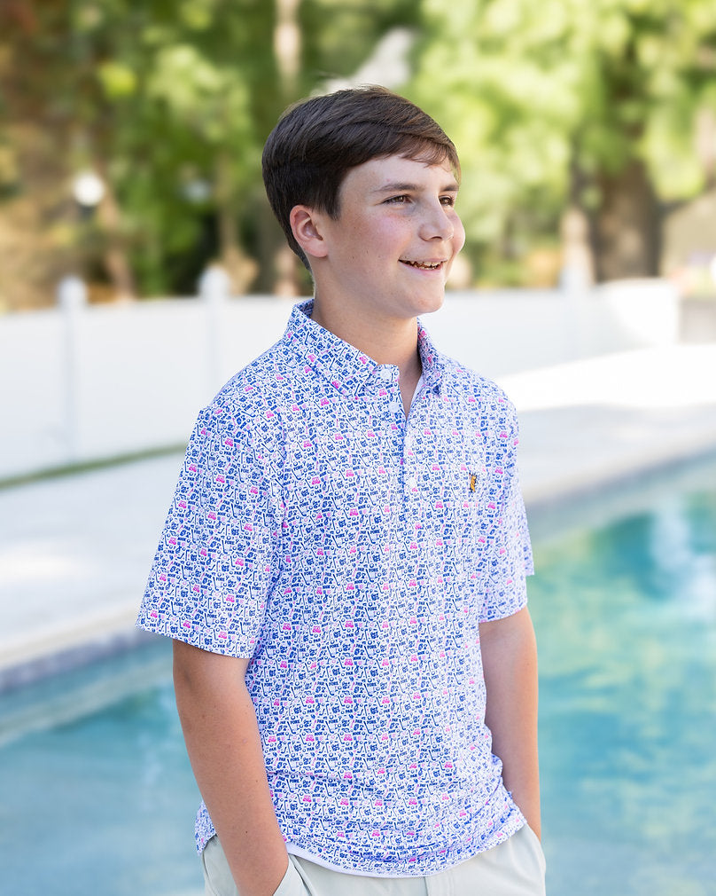 Youth Tally Polo by Caddie featuring a white collared shirt with a subtle logo, ideal for casual or sport wear.