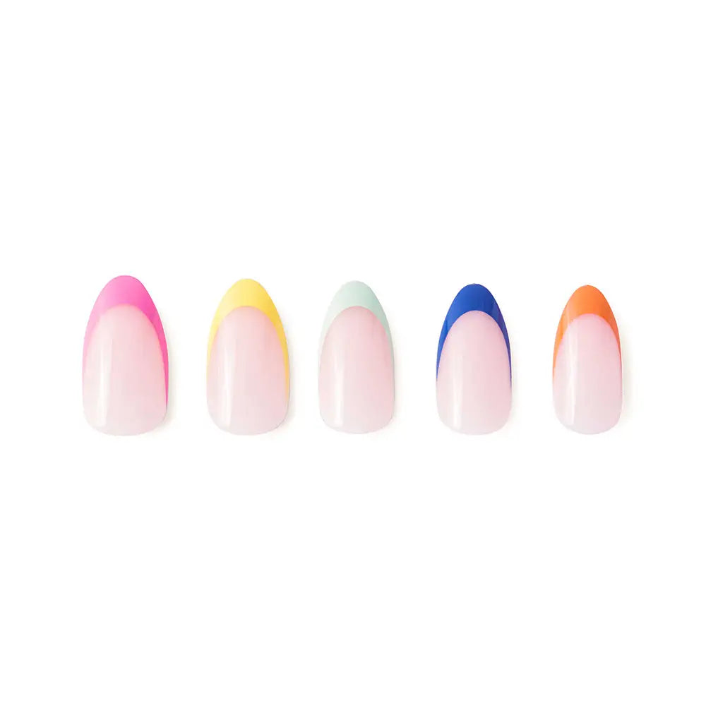 Bright multicolor short almond press-on nails by Glamnetic with colorful sprinkle designs on a natural hand model