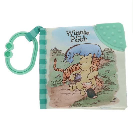 Soft Disney Classic Pooh plush book by Kids Preferred featuring colorful fabric pages and a cuddly Pooh bear character.