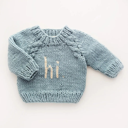 Huggalugs Hi. Surf Blue crew neck sweater for baby and toddler, soft knit with long sleeves and ribbed collar.