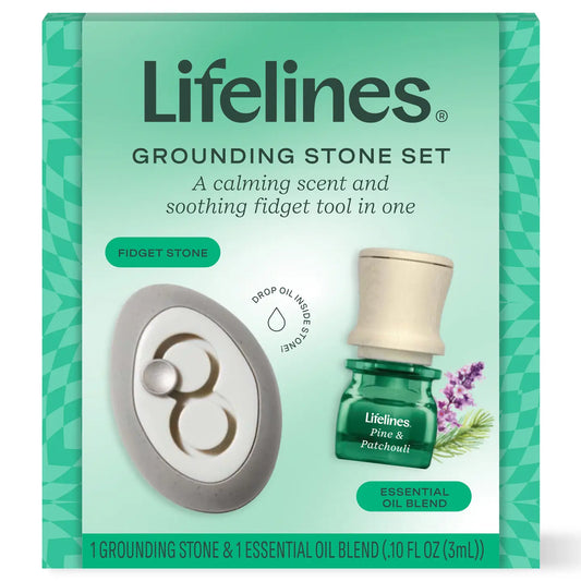 Lifelines grounding stone set with pine and patchouli scent, featuring smooth stones arranged in a calming display.