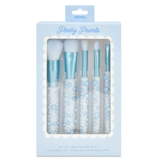 Set of five blue pearl makeup brushes from Iscream, including eye, face, and blending brushes arranged on a white background.