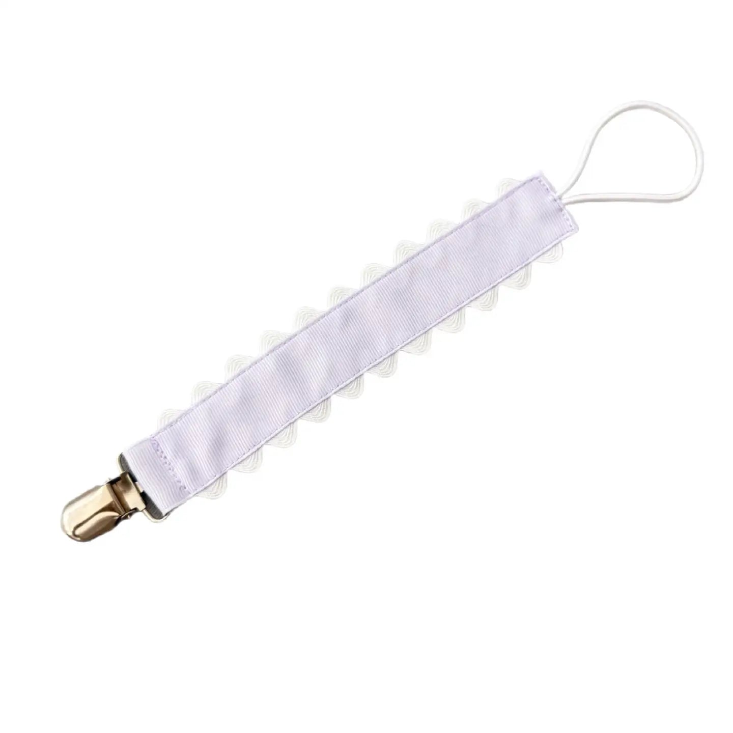 Hampton James Lavender pacifier clip featuring soft fabric and clip attachment, designed to keep pacifiers secure for babies.