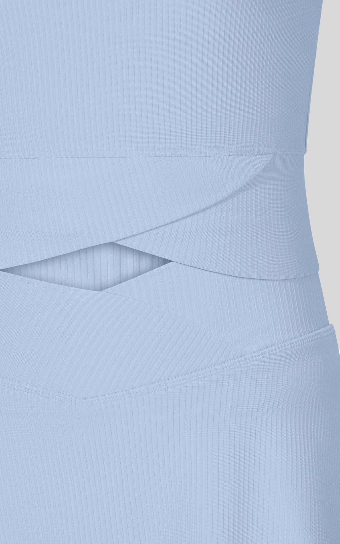 Powder blue ribbed Marie crossover top and matching skort set by 90 Degree by Reflex, stylish and comfortable activewear ensemble.