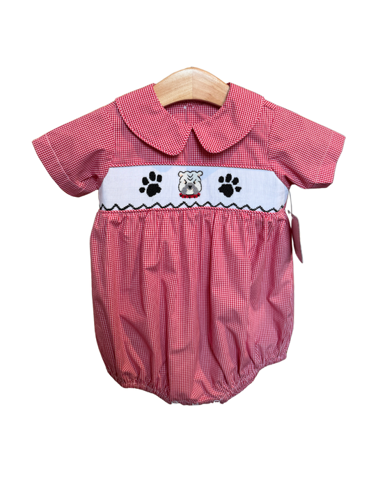 Red and white mini gingham smocked bulldog bubble for babies by Remember Nguyen, featuring a cute smocked bulldog design.