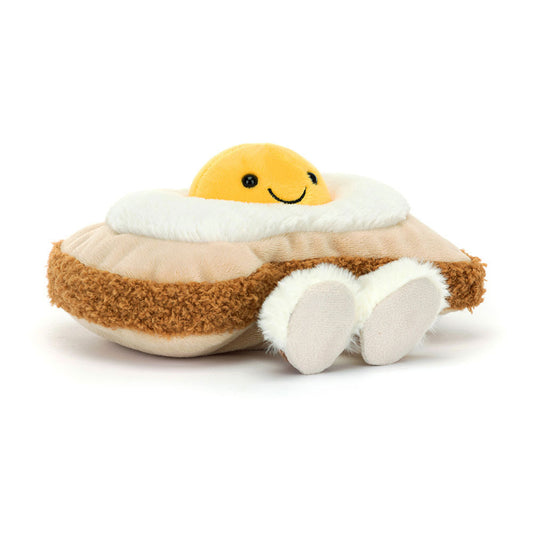 Cute Jellycat Amuseables Egglantine Egg on Toast plush toy with cheerful face and soft, textured fabric.