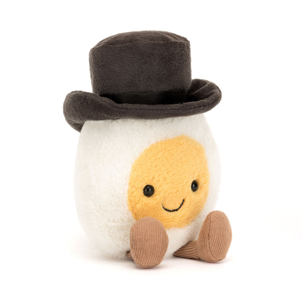 Jellycat Amuseables Boiled Egg Groom plush toy with yellow egg shell and cheerful face, soft and cuddly for children.