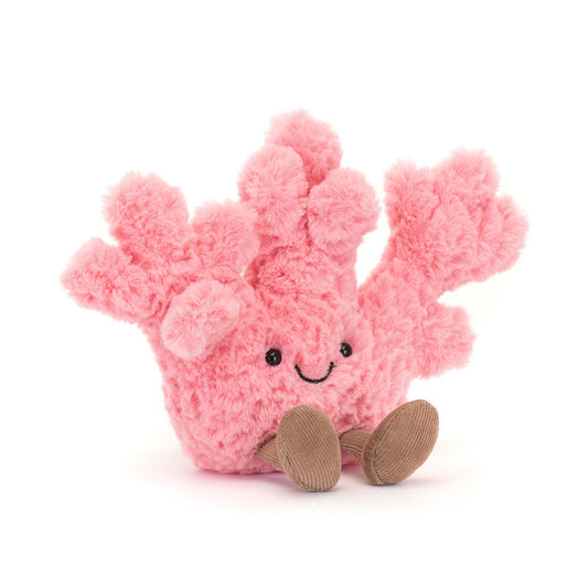 Soft Jellycat Amuseables Coral plush toy with cheerful coral-colored design and friendly face, perfect for cuddling.