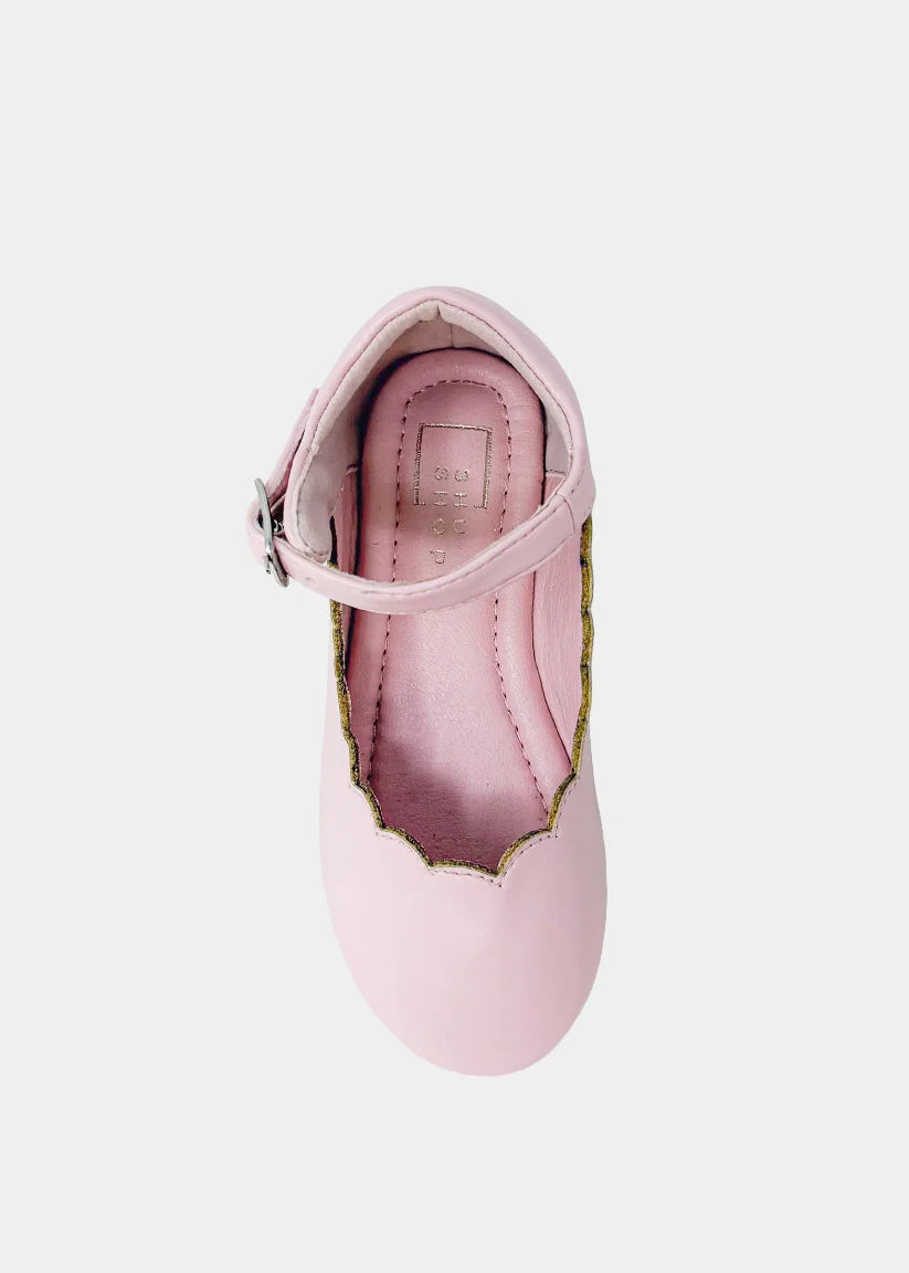Mini pink Agatha handbag by Shushop featuring a compact design and stylish pink color, displayed on a neutral background.