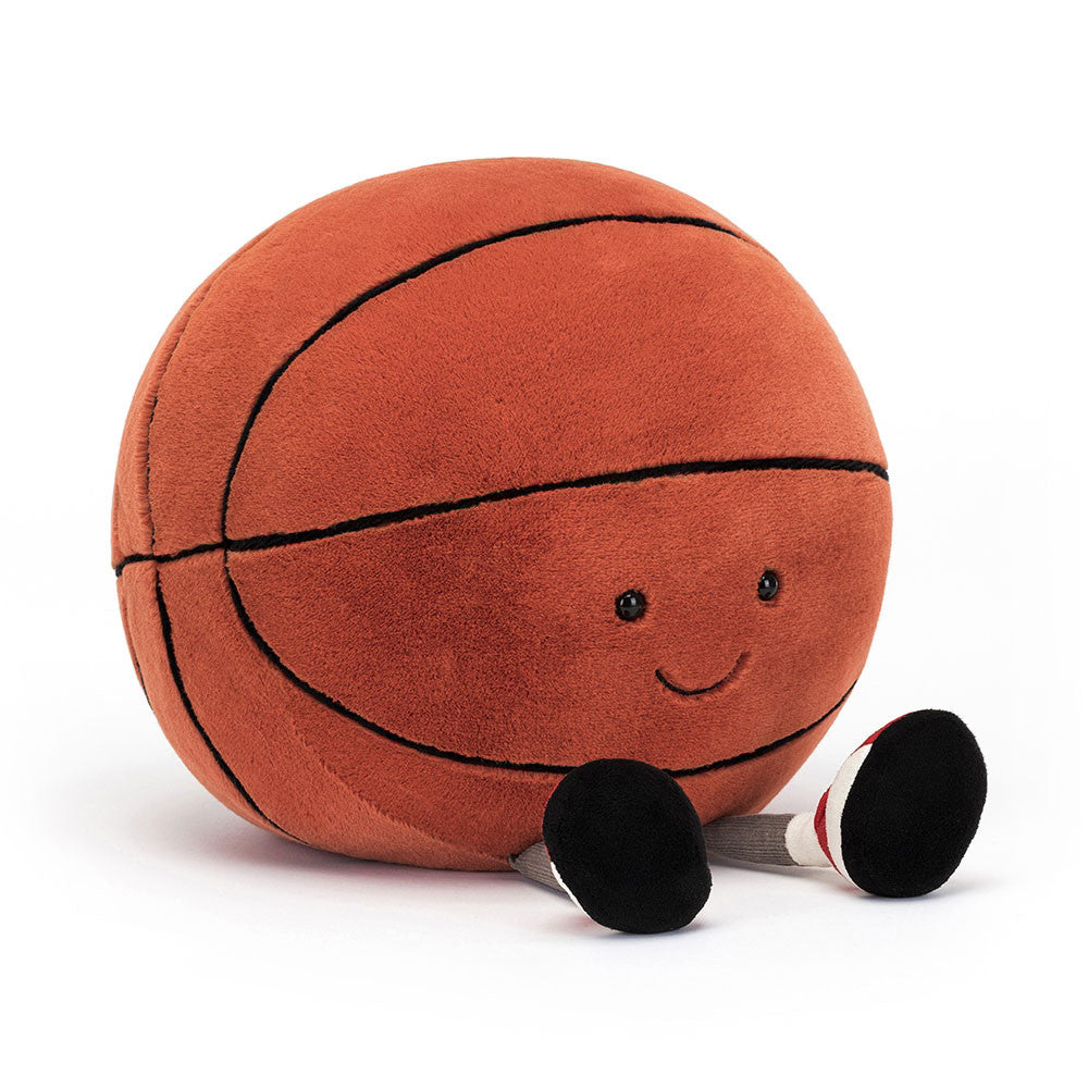Soft Jellycat Amuseables Sports Basketball plush toy with a friendly face and vibrant orange color, perfect for playtime.
