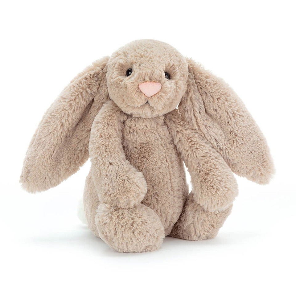 Jellycat Bashful Beige Bunny plush toy with soft fur and long floppy ears, sitting on a neutral background.
