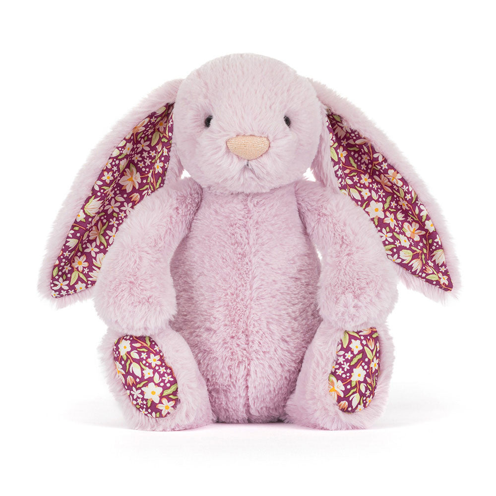 Jellycat Thistlepop Blossom Luxe Bunny with soft pastel fur and adorable floral accents, sitting against a light background.