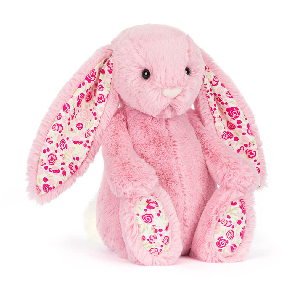 Soft pink Blossom Luxe Bunny plush toy by Jellycat with fluffy fur and embroidered facial features.