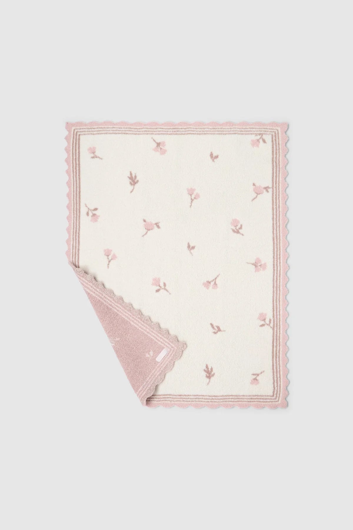Barefoot Dreams CozyChic Heirloom Floral stroller blanket with faded rose and multi-color floral pattern on soft fabric.