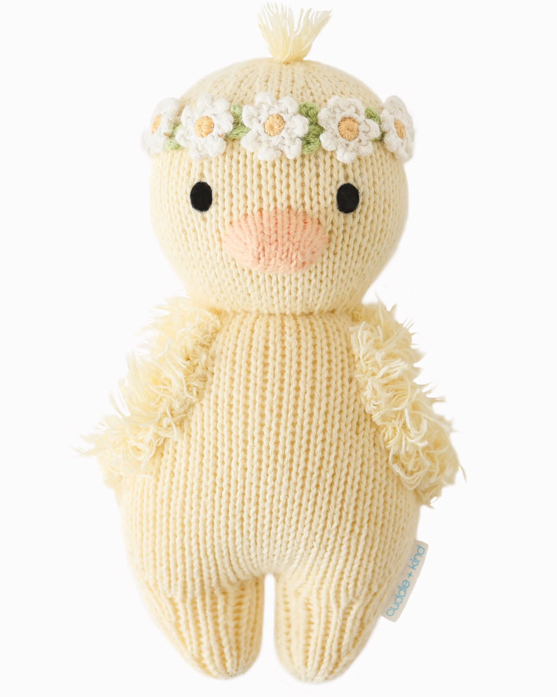 Soft baby duckling plush toy with ivory floral pattern from cuddle + kind, featuring detailed embroidery and gentle textures.