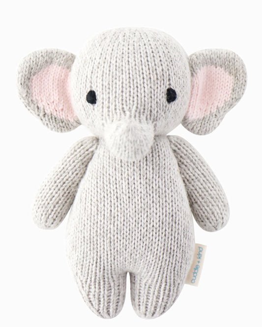Soft plush baby elephant toy from cuddle + kind, featuring gentle gray fabric and embroidered eyes, ideal for infants and toddlers.