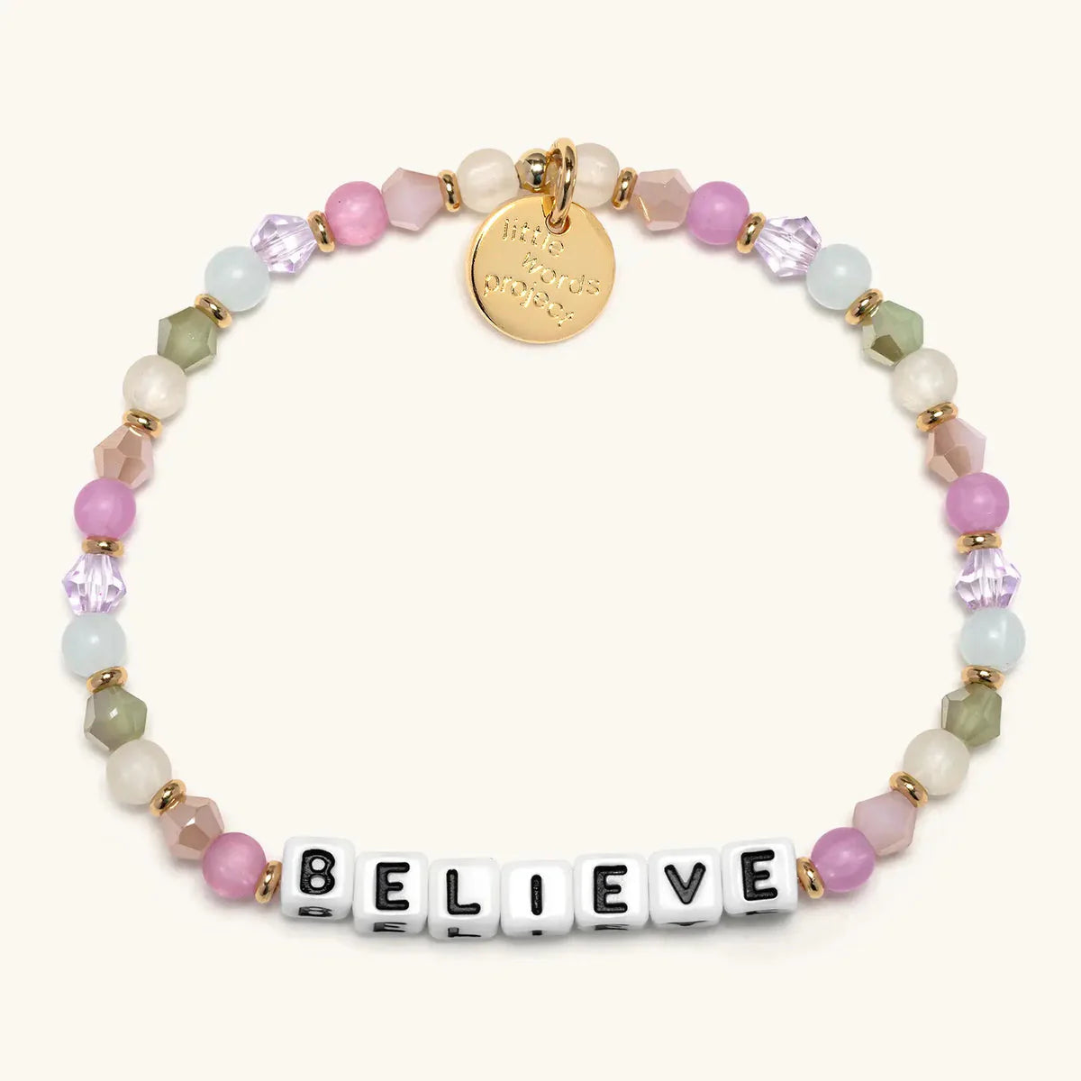 Little Words Project bracelet with inspirational "Believe" charm, featuring colorful beads on a stretchy cord.