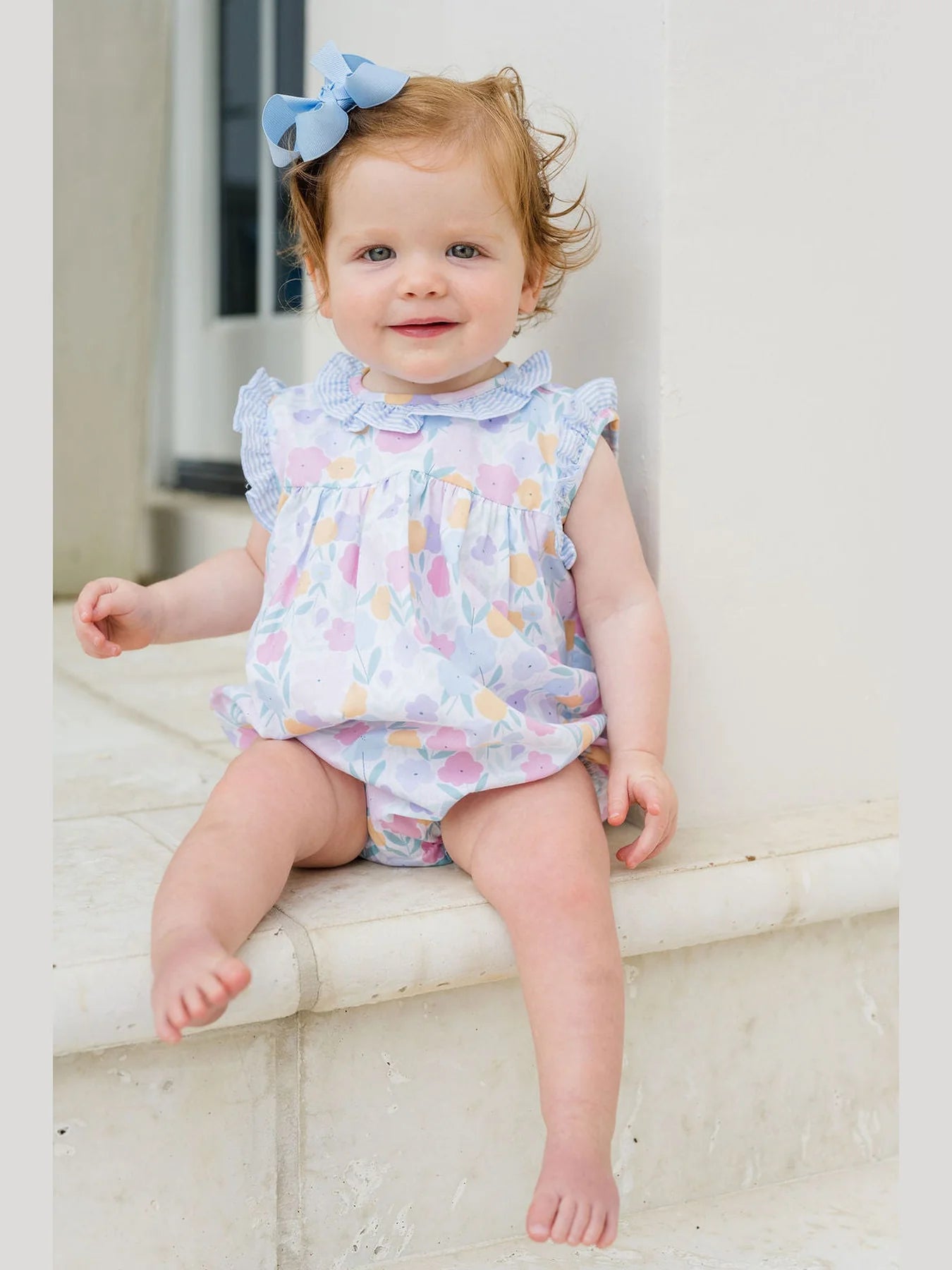 Vintage floral Rosie bubble print dress by James & Lottie, featuring a colorful floral pattern and classic bubble silhouette.