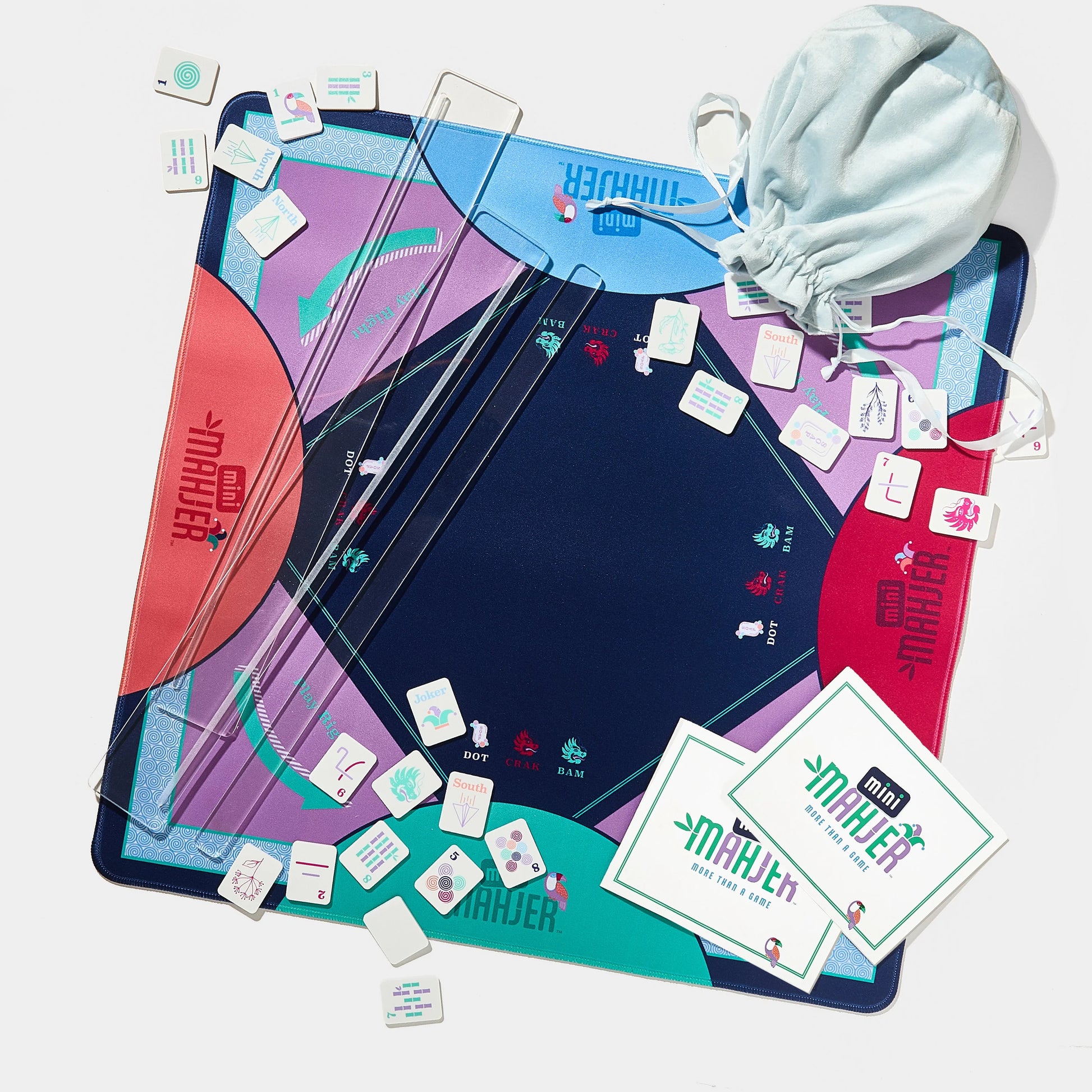 Mini Mahjer Complete Game: OG Edition box with game components and artwork for the popular board game.