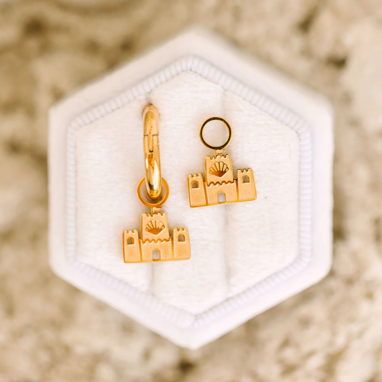 Colorful Sandcastle Charms from Pierced Co featuring tiny, detailed beach-themed designs for jewelry or crafts.