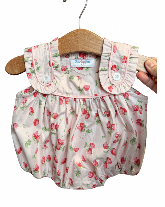 Strawberry sleeveless ruffle bubble dress by Lulu Bebe featuring a playful strawberry print and ruffled details.