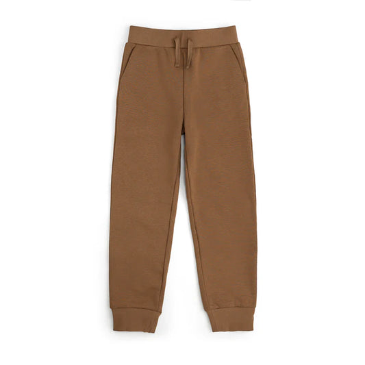 Brown jogger pants from Sweet Wink with a relaxed fit and elastic waistband, perfect for casual wear and comfortable style.