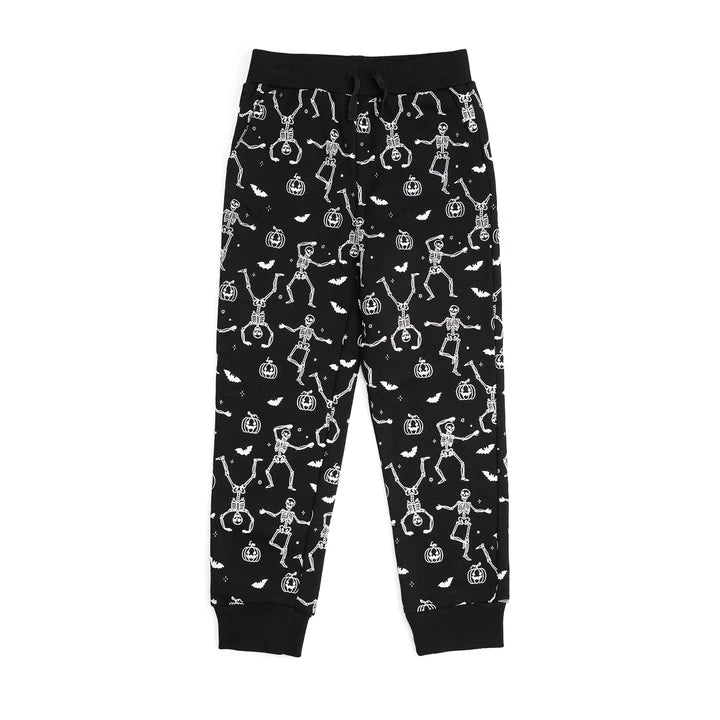 Glow in the dark Silly Skelly Halloween jogger pants by Sweet Wink, featuring spooky skeleton designs on comfortable fabric.