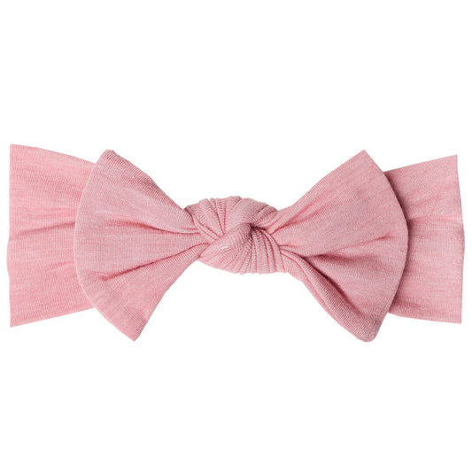 Copper Pearl Darling knit headband with a bow, soft and cozy baby accessory in a stylish design.