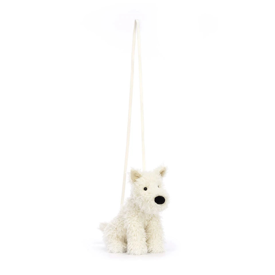 Jellycat Munro Scottie Dog Bag featuring a soft plush Scottie dog design with a handle and detailed facial features.