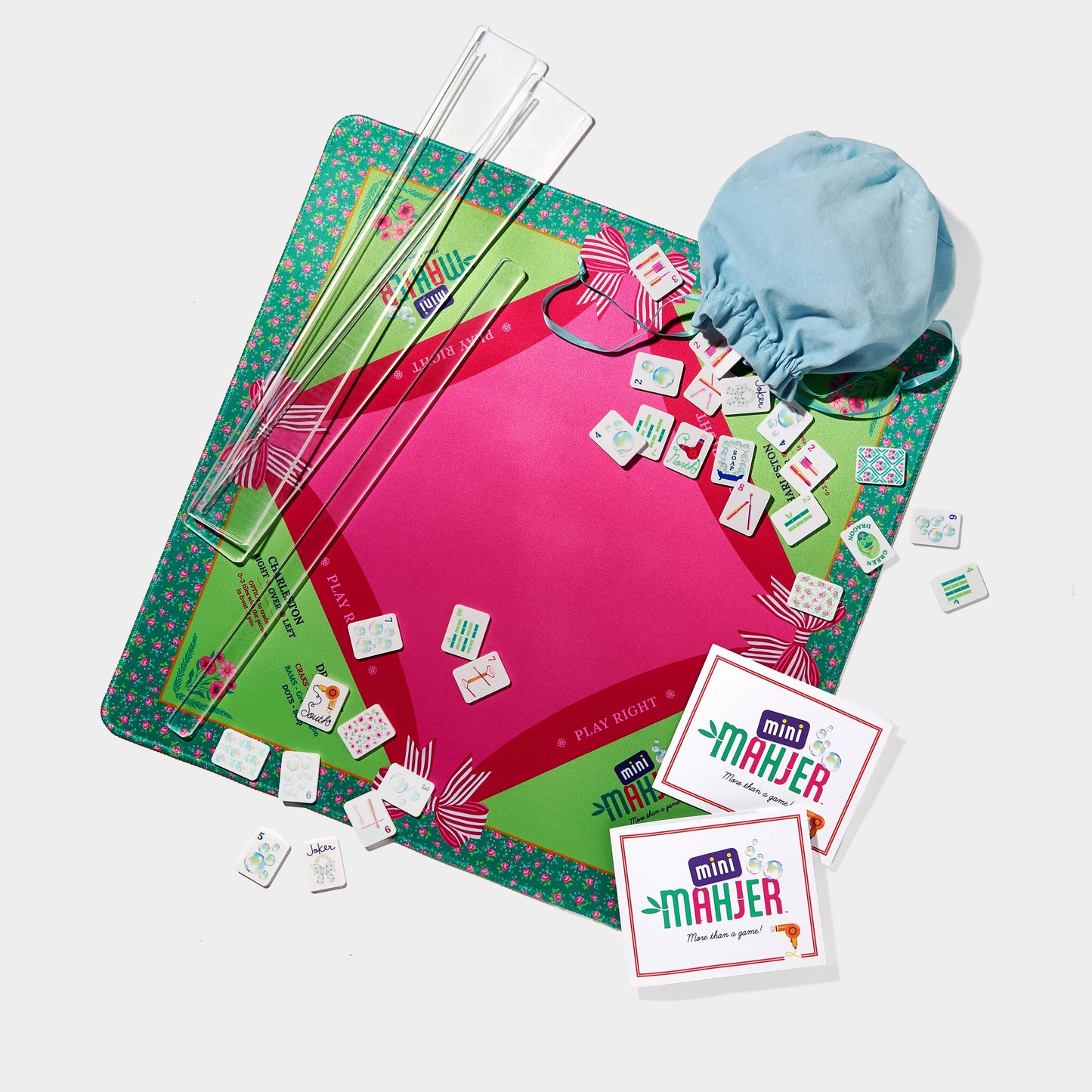 Complete Bubbles & Bows Edition game by Mini Mahjer featuring colorful game components and vibrant packaging.