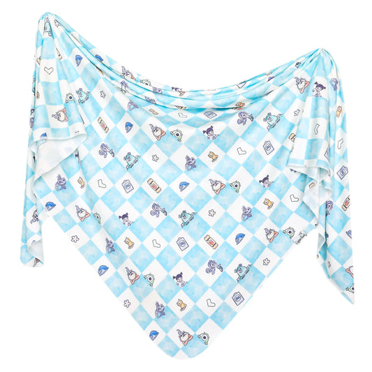 Copper Pearl Monsters Inc. Medley Knit Swaddle Blanket featuring Monsters Inc. characters in soft, cozy knit fabric for babies.