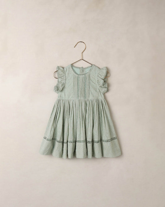Eucalyptus Isla Dress by Noralee featuring a flowy design with eucalyptus print fabric and adjustable straps.