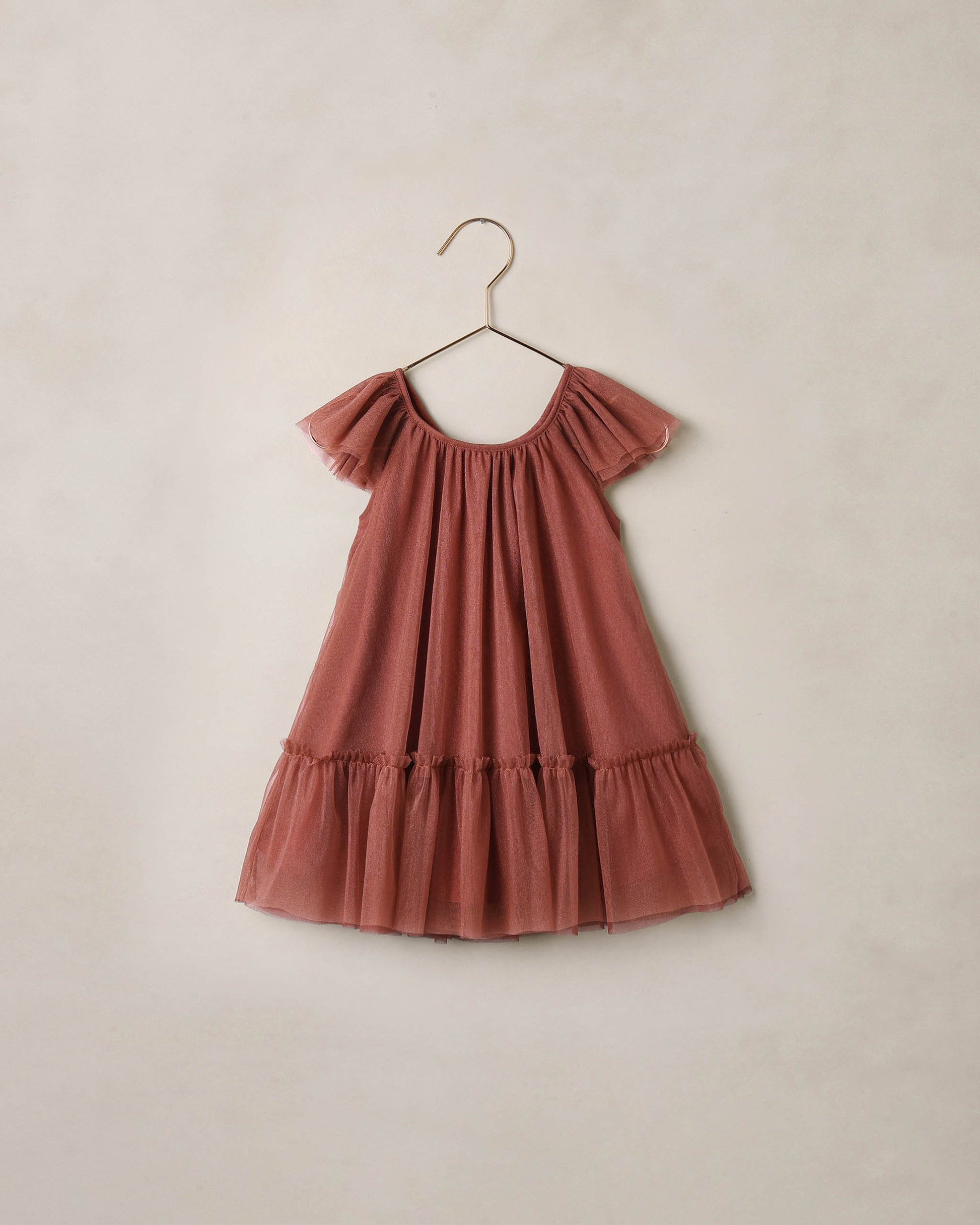 Noralee Spice Edie Dress in vibrant red with floral pattern, sleeveless design, and fitted silhouette.