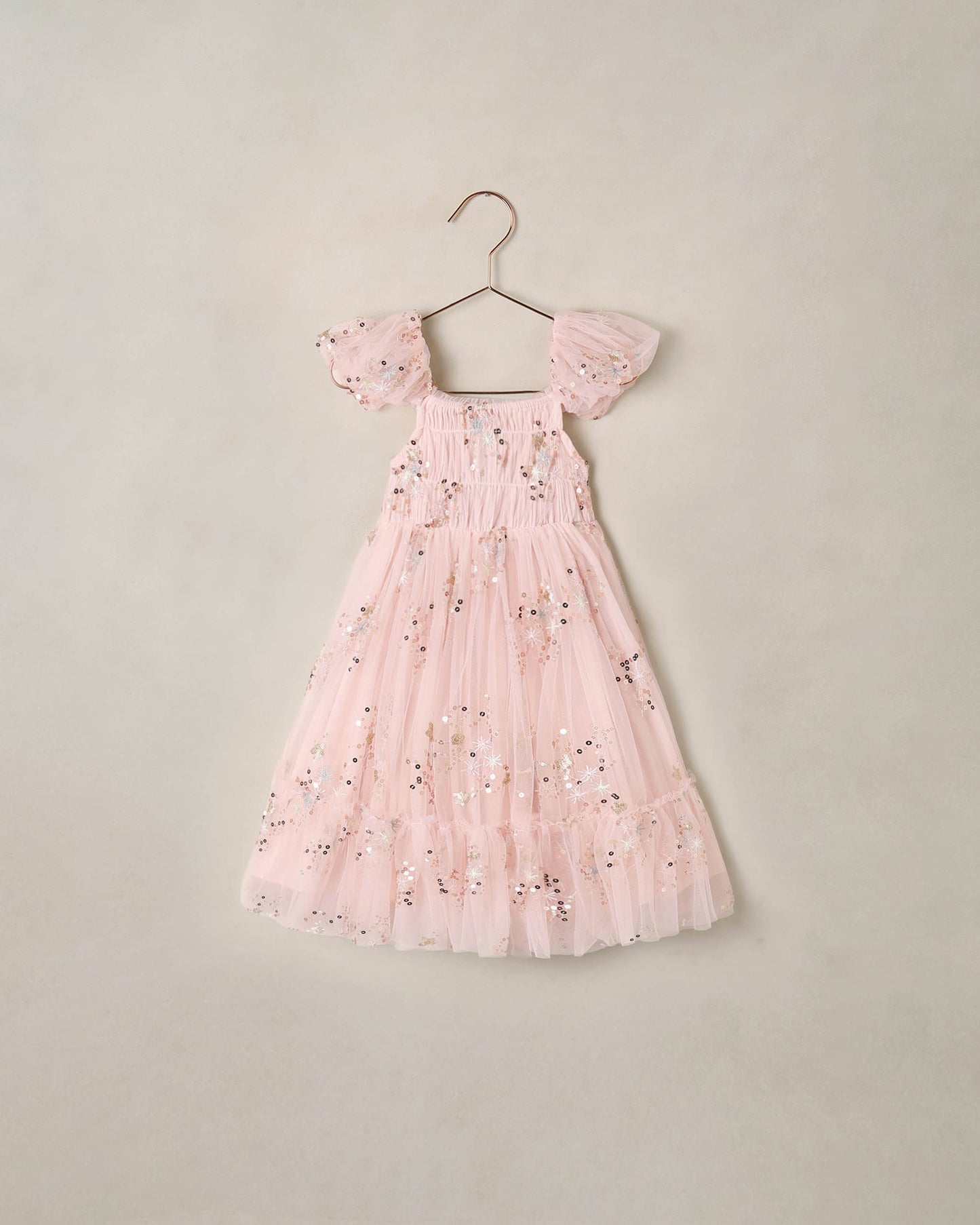 Pink Clara dress by Noralee, featuring a stylish design with soft fabric and feminine details, shown on a model.
