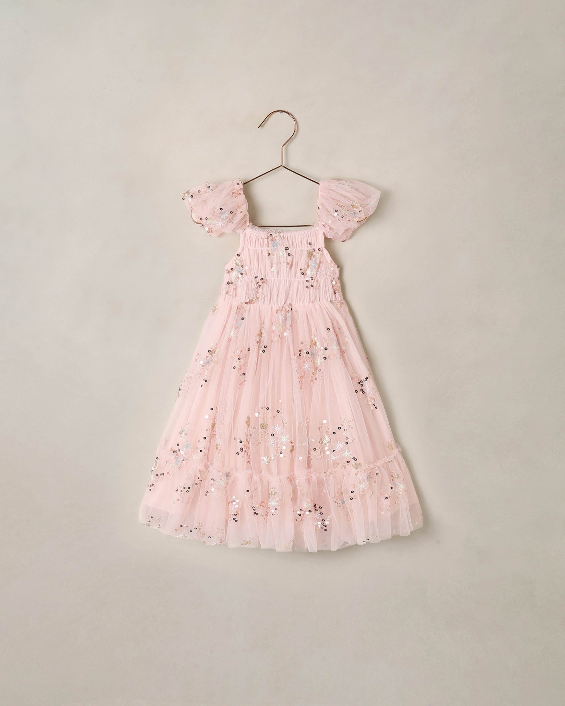 Pink Clara dress by Noralee, featuring a stylish design with soft fabric and feminine details, shown on a model.