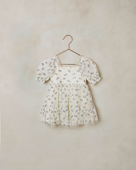 Noralee Bows Louella Dress in natural fabric, featuring a stylish design with bow accents and comfortable fit.