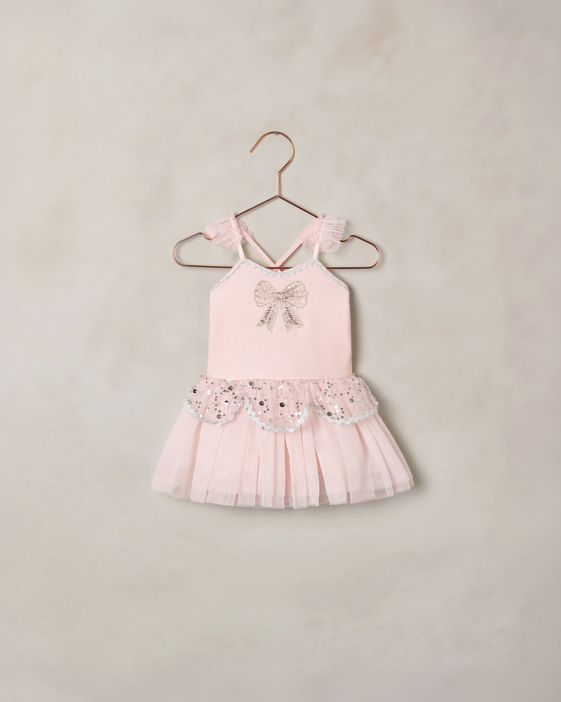 Pink Elise tutu by Noralee, featuring soft pink tulle layers and a delicate waistband, perfect for dance or costume wear.
