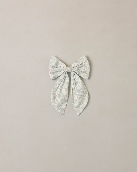Noralee Sky Floral Everly Bow in ivory, featuring a soft fabric bow with floral pattern, perfect for accessories and hair styling.
