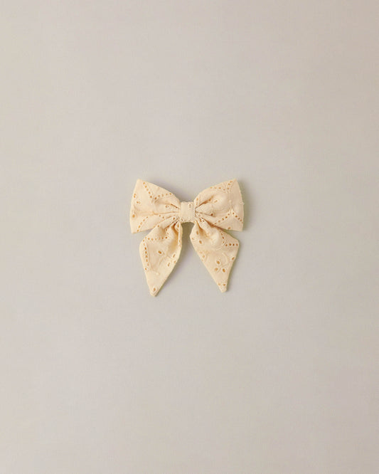 Noralee Lemon Norah Bow hair accessory with yellow fabric and decorative bow, suitable for children or adults.