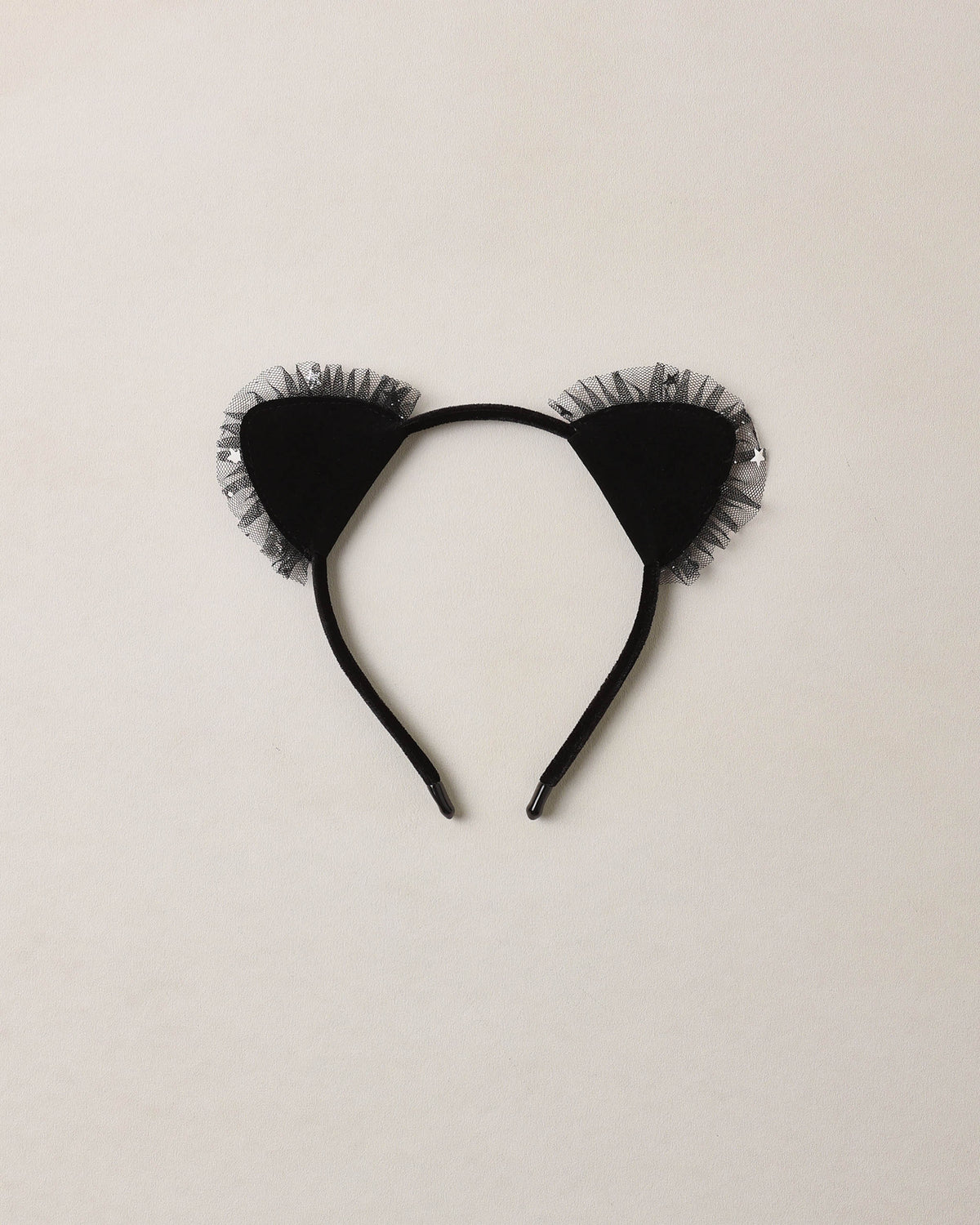 Black cat headband by Noralee with feline-shaped ears, perfect for costume or everyday wear.