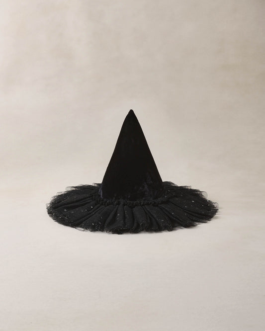 Black Noralee witch hat with pointed tip and wide brim, made of soft black fabric, perfect for Halloween costumes or themed events.