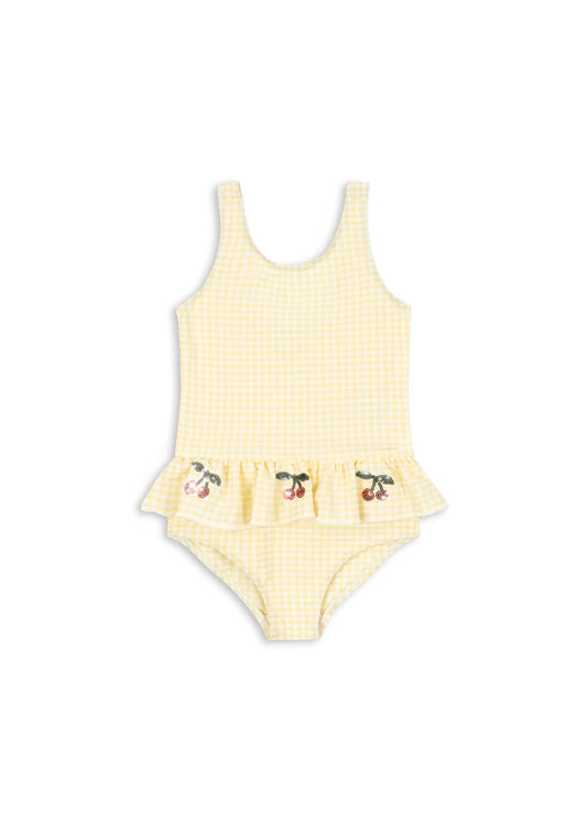 Konges Slojd Banana Almond Check Etta swimsuit featuring a playful check pattern and bright colors for children's swimwear.