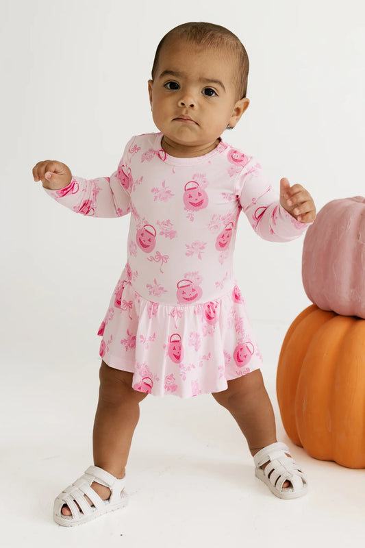 In My Jammers Candy Pail Garden Twirl Bodysuit featuring colorful candy pail and garden print on a playful bodysuit.