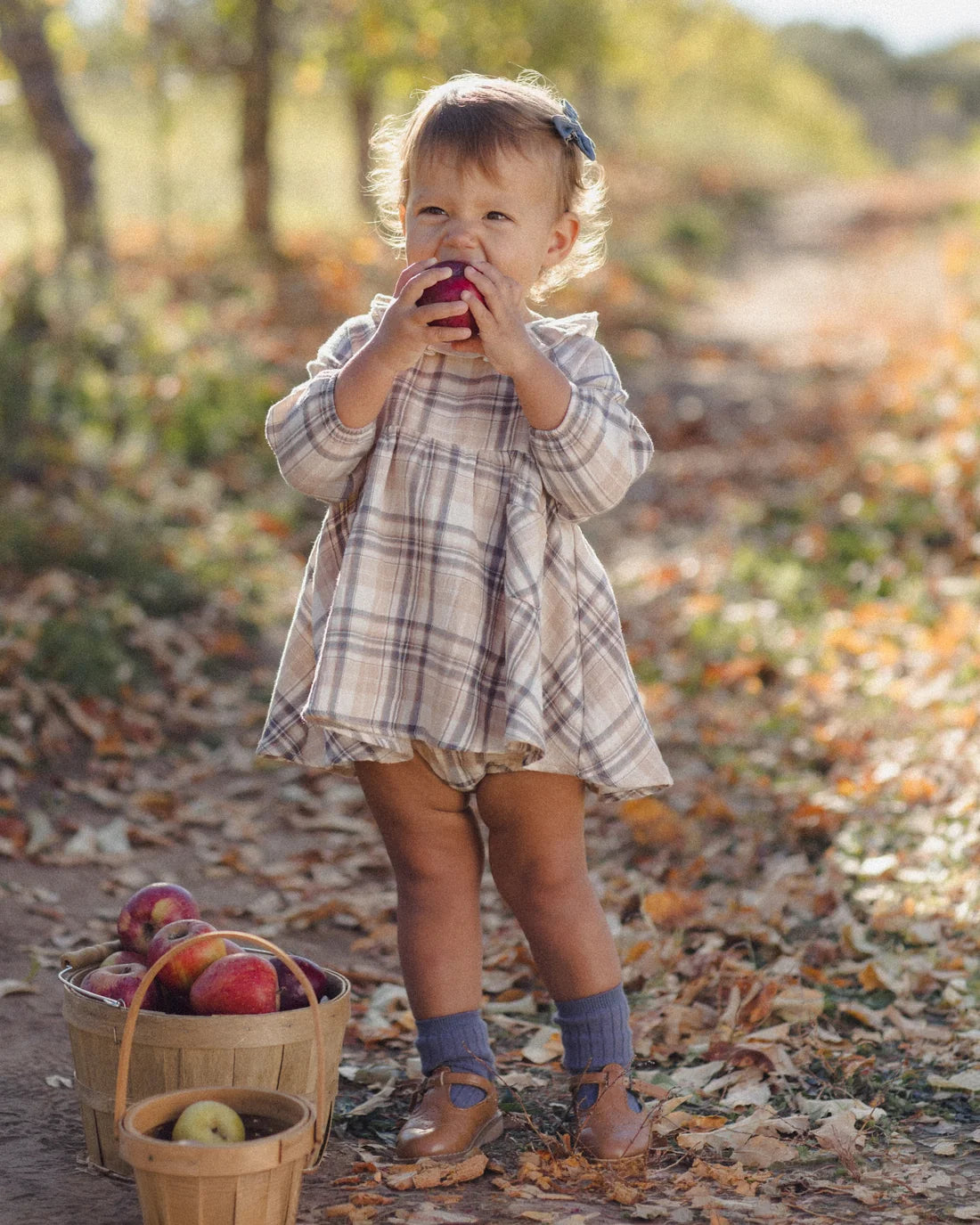 Quincy Mae Fall Plaid Simone Dress in cozy plaid fabric, styled for autumn with a relaxed fit and charming design.
