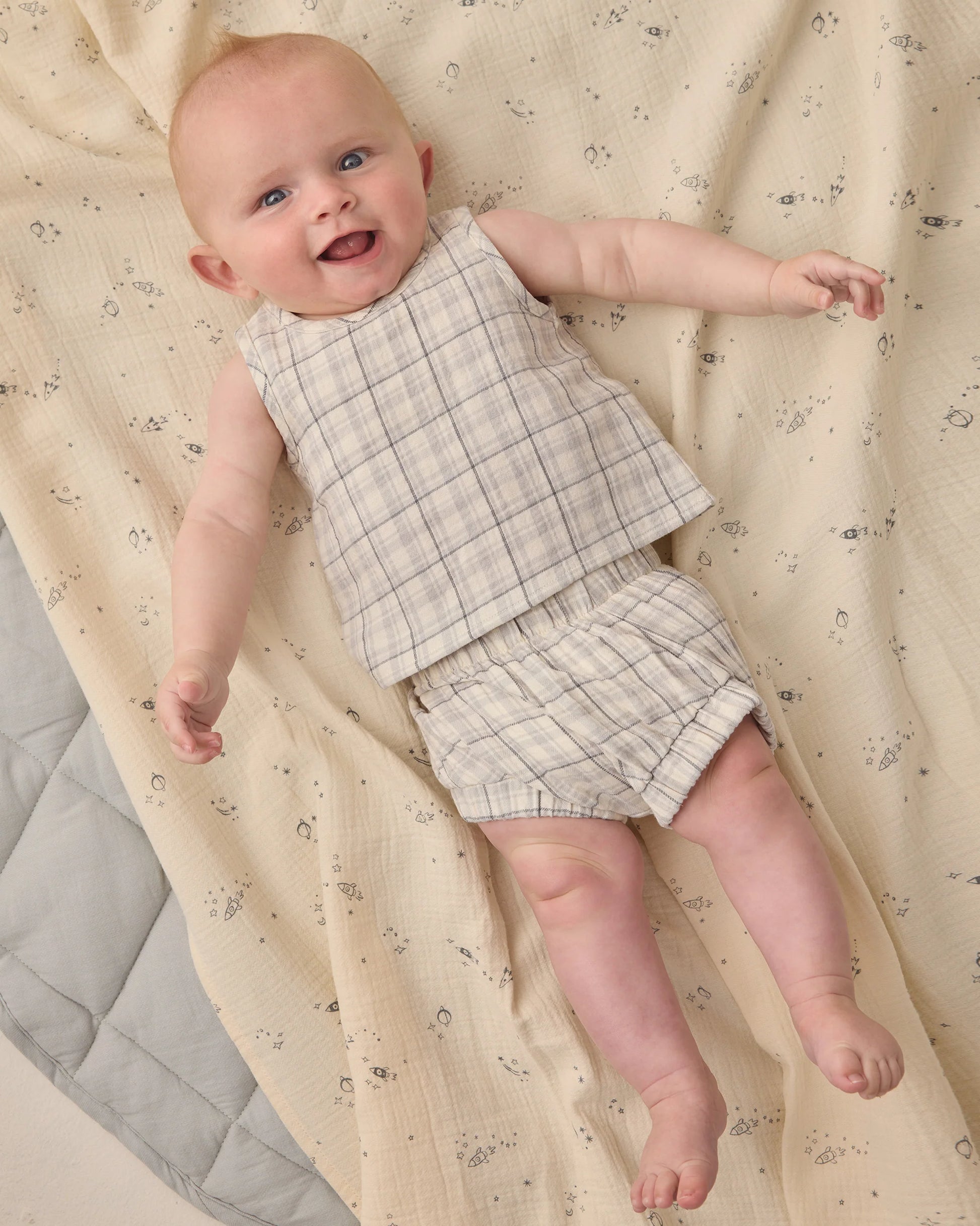 Blue plaid woven tank top and shorts set for kids by Quincy Mae, featuring a comfortable, stylish design with a woven fabric texture.