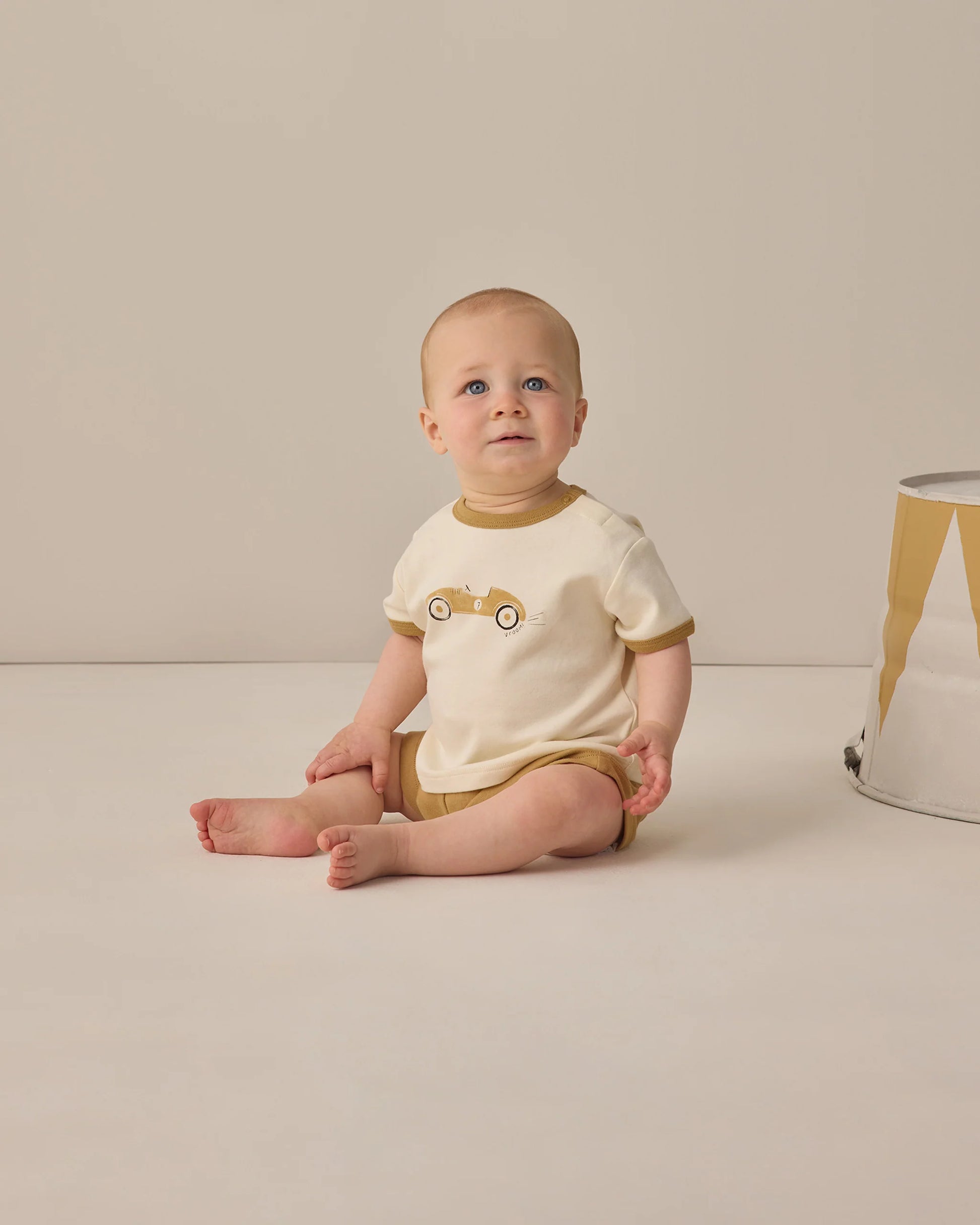 Quincy Mae Honey Play Short in soft fabric with elastic waistband, shown in a relaxed fit on a neutral background.