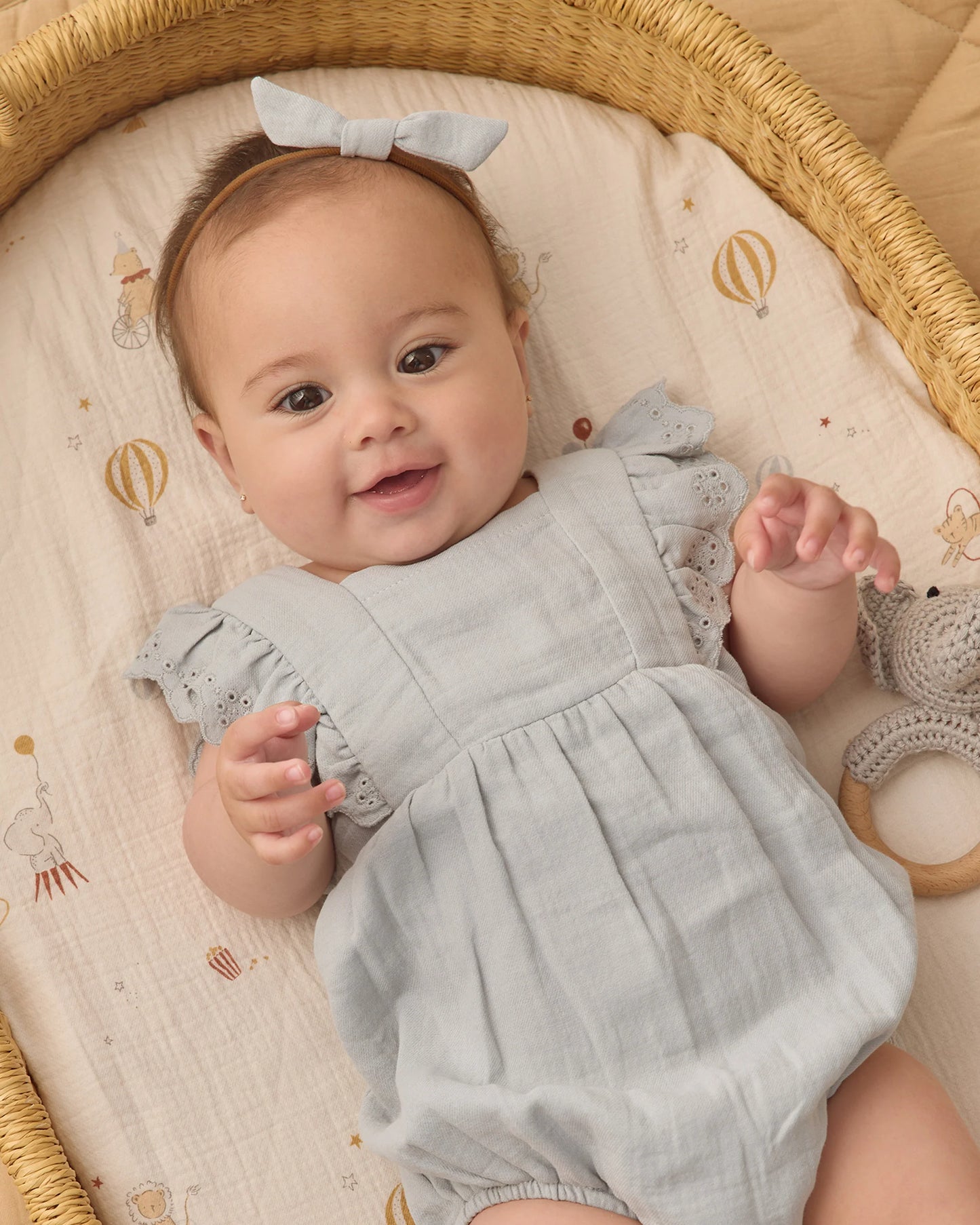 Sky Naomi romper by Quincy Mae, featuring soft fabric and a stylish design, displayed on a neutral background.