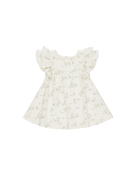 Quincy Mae Bunnies Flutter Dress in ivory, featuring a soft fabric with bunny print and flutter sleeves for a cute, comfortable look.